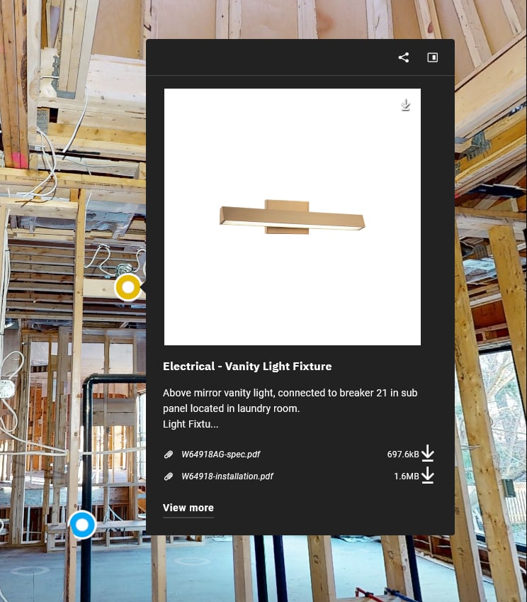 A fixture tag popup in a construction scan labelled Electrical — Vanity Light Fixture, with the fixture image, a description noting panel and sub-panel routing, and PDF attachments for spec and install sheets